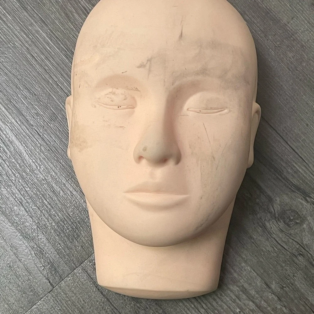 Realistic Cream Head Sculpture